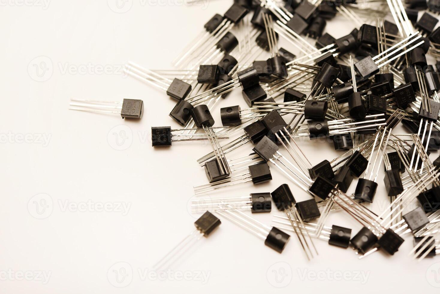 Microelectronic plastic transistor units. A bipolar transistor for electronics. photo