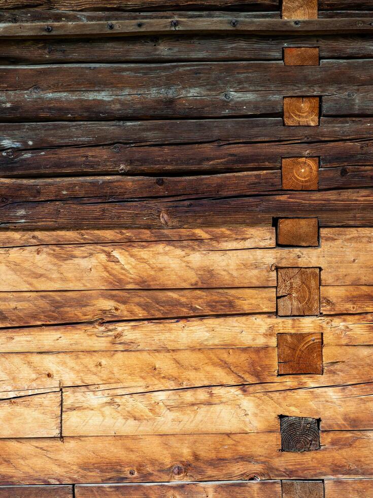 A wooden wall with a clock on it photo