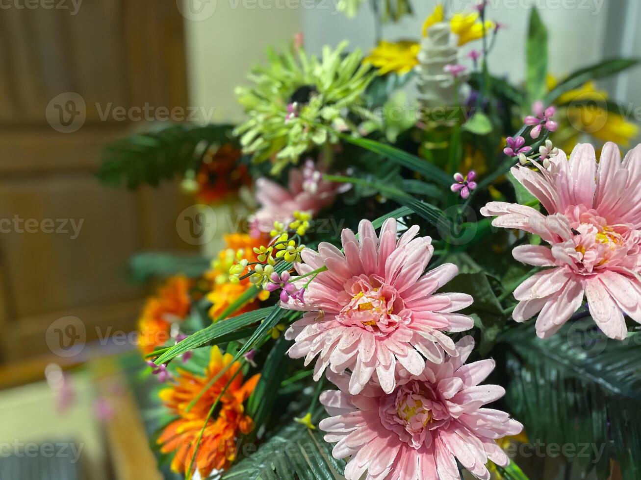 A vase with flowers in it photo