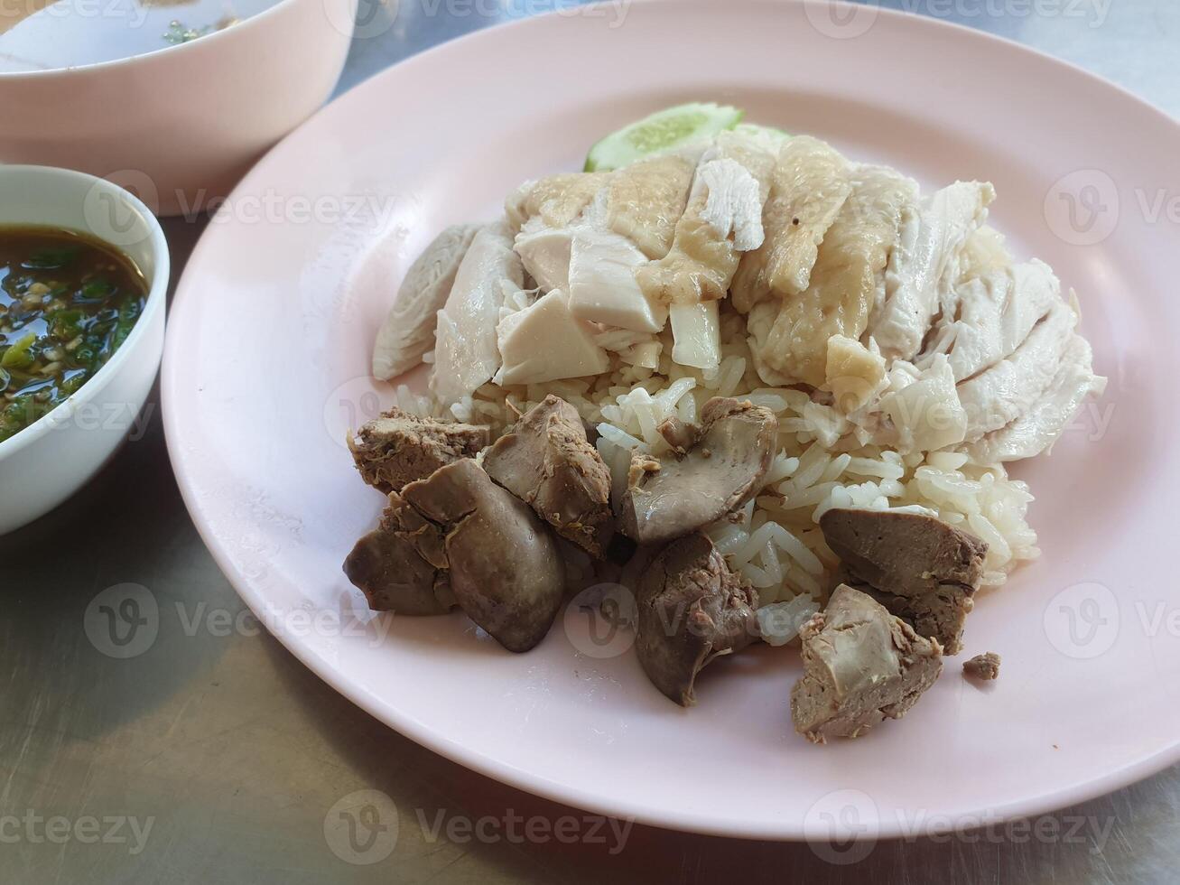 A plate of food with meat and rice photo