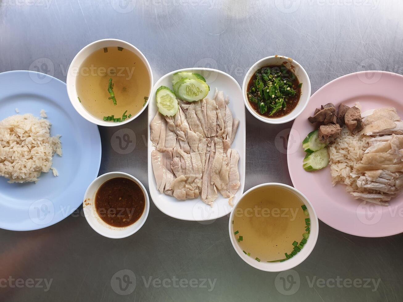 A table with four plates of food on it photo
