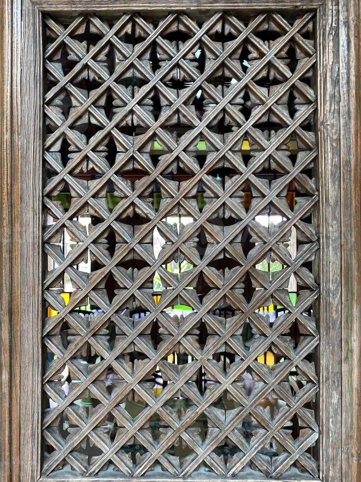 A wooden frame with a window photo