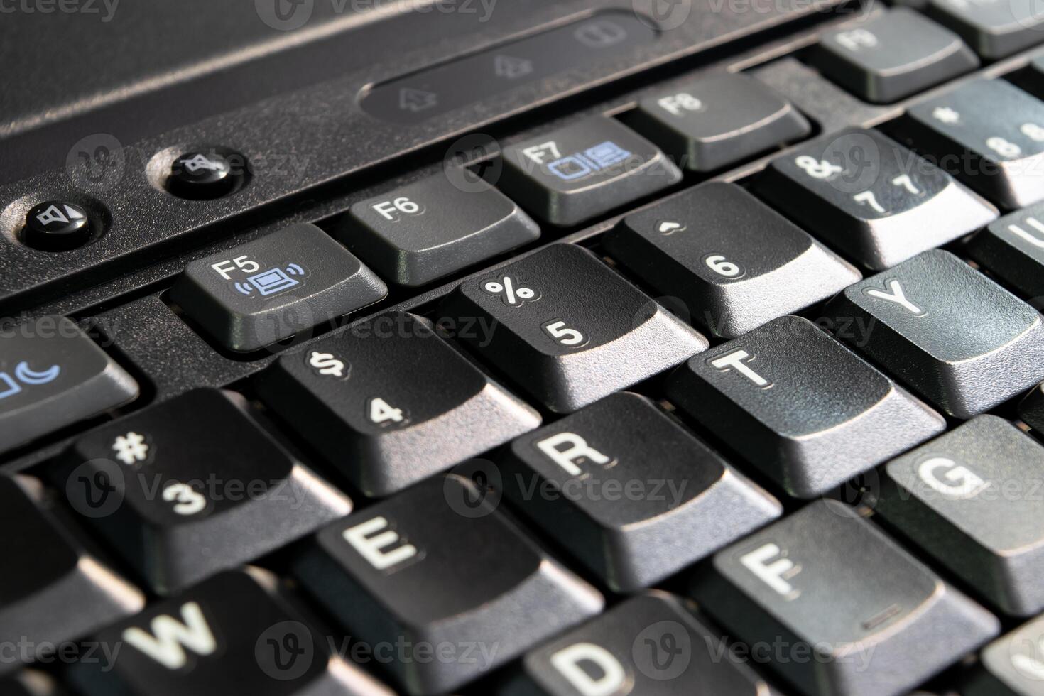 A close up of a keyboard on a laptop computer photo