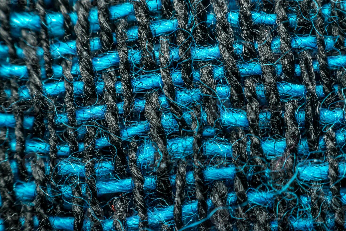 Close up of a blue and black woven fabric photo