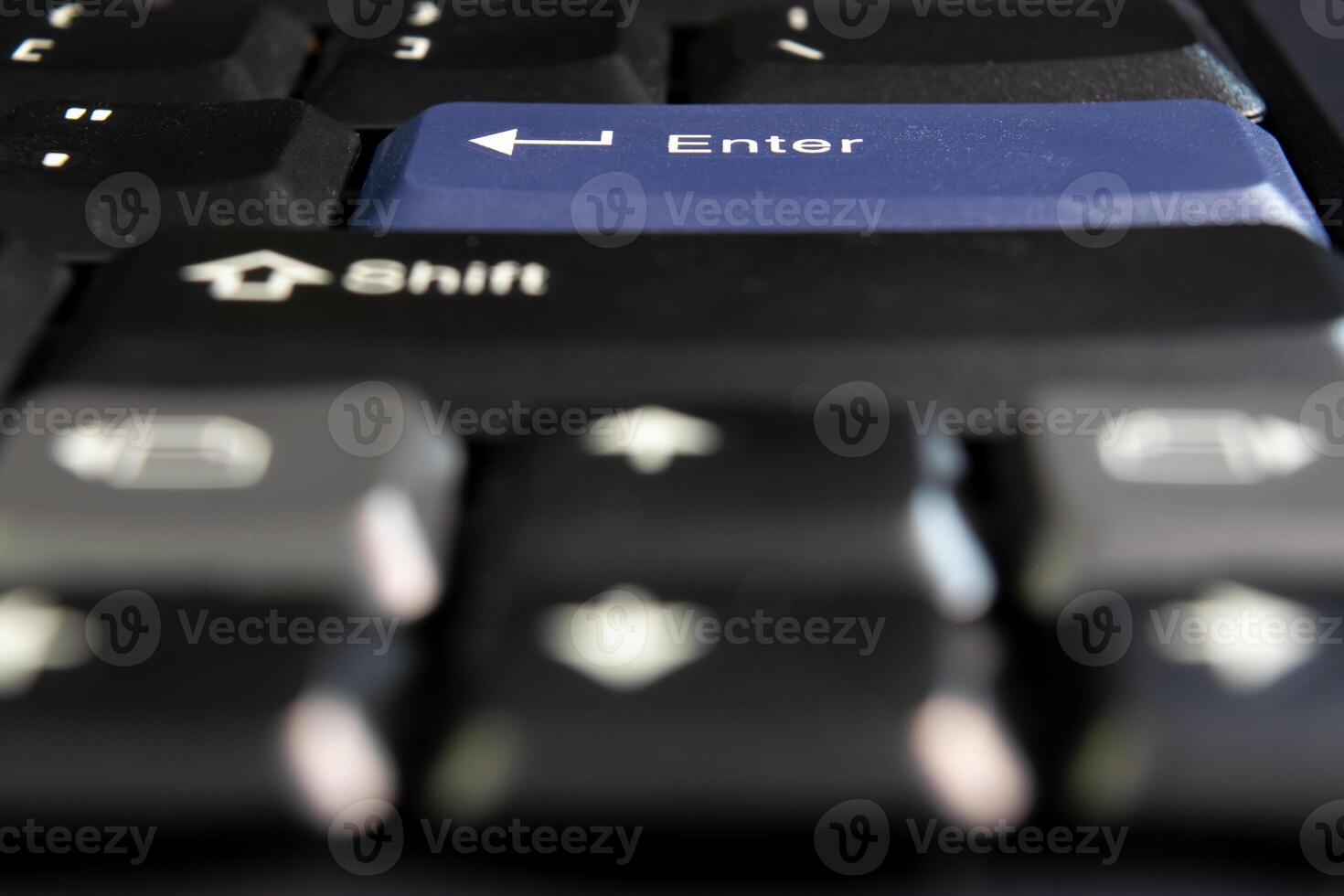 A close up of a keyboard with a shift key photo