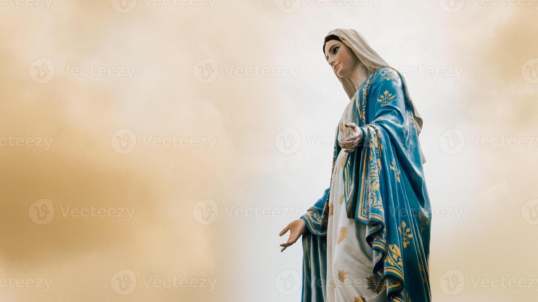 A statue of mary holding a child photo