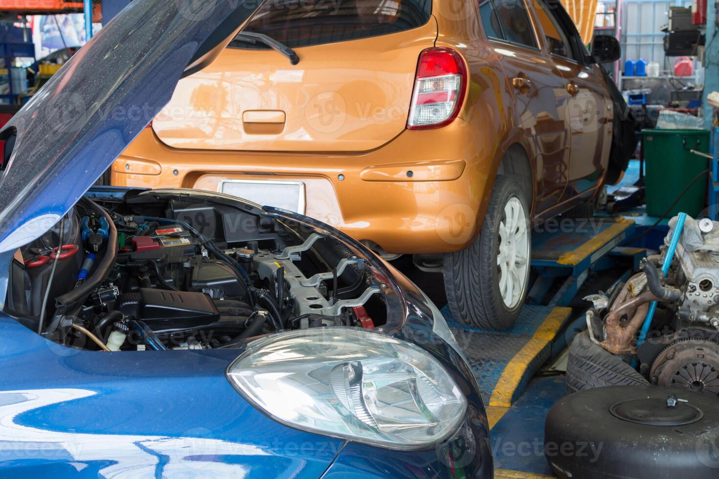 A blue car on the ground photo