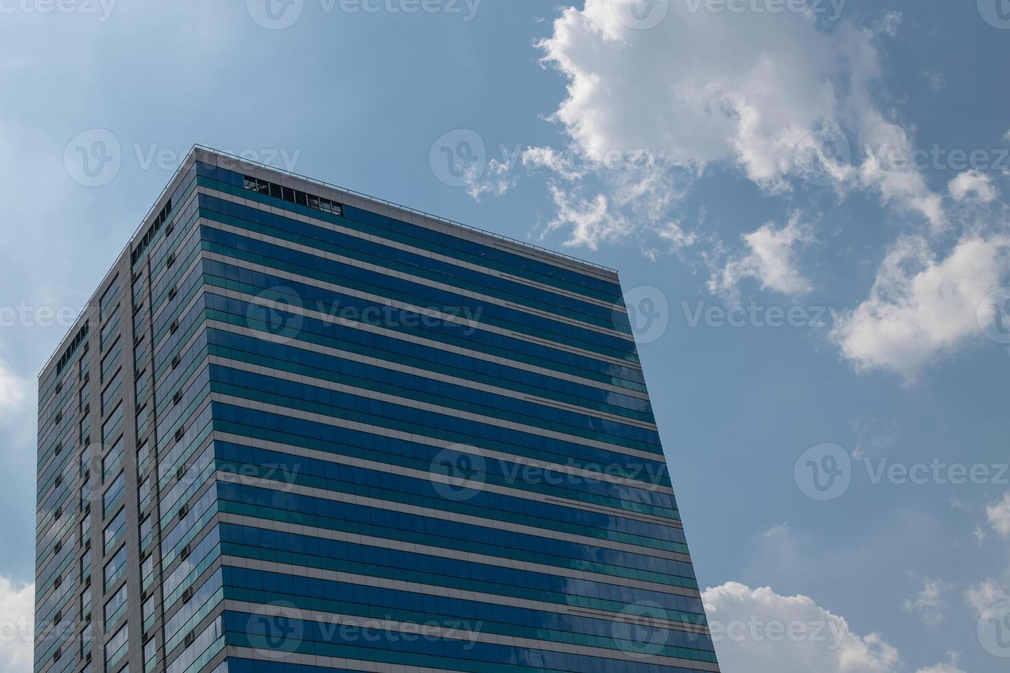 A tall building with a clock on it photo