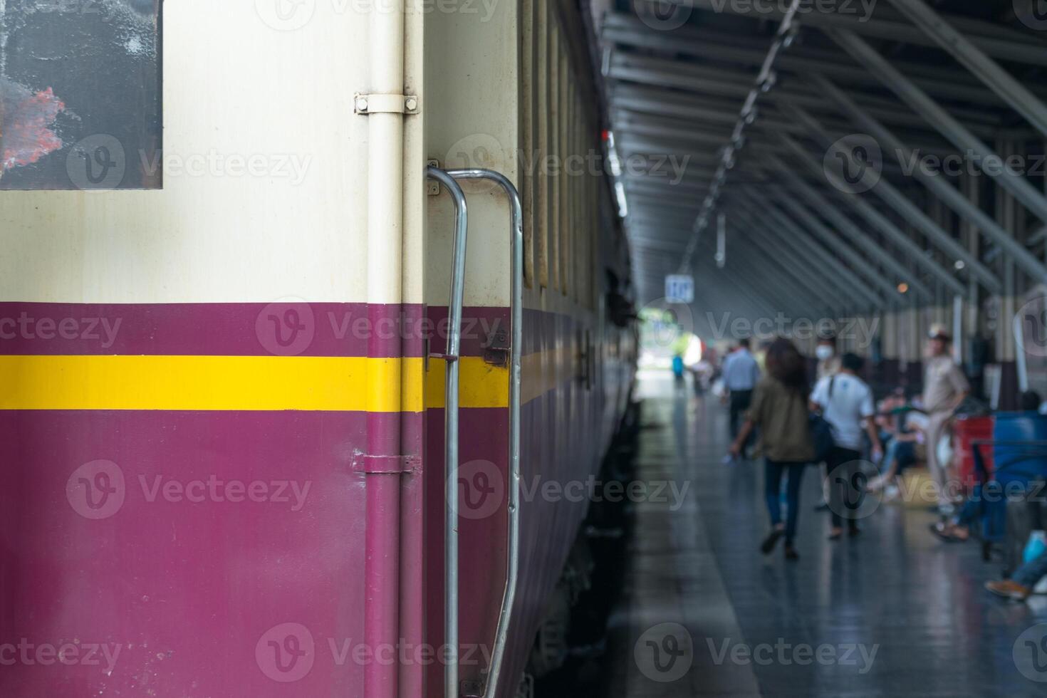 A train is parked at a train station photo