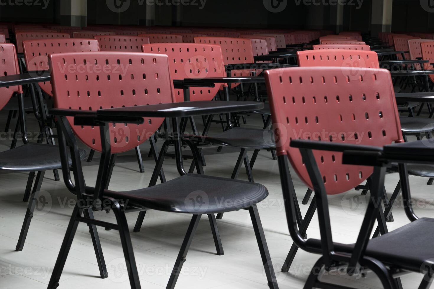 A row of chairs in a classroom photo