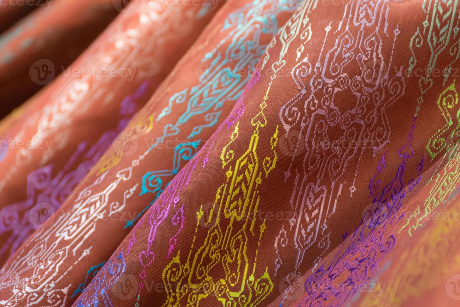 A close up of a colorful patterned fabric photo