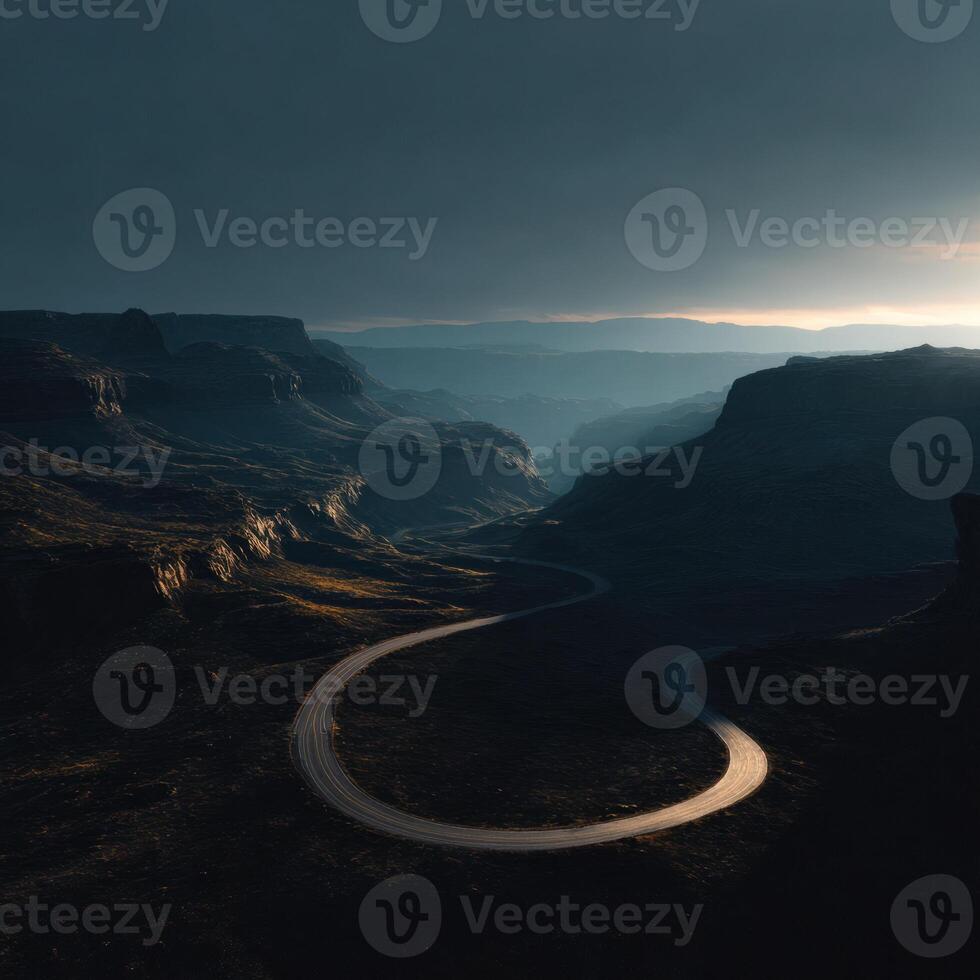 A winding road in the middle of a canyon photo