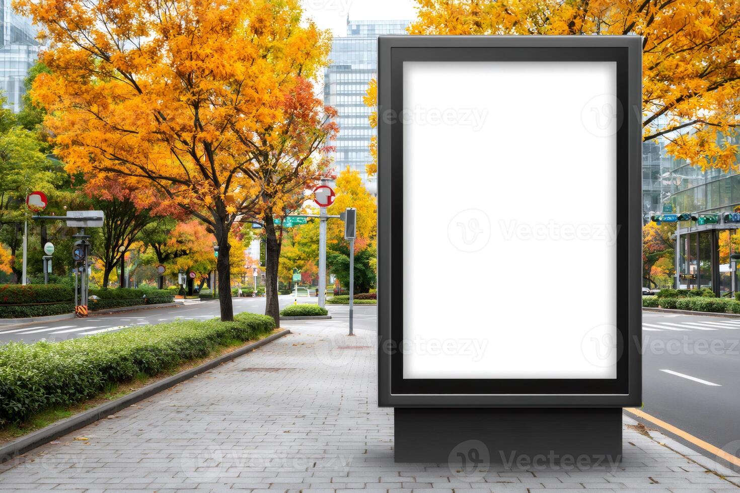 Blank billboard mockup on city street with autumn trees photo
