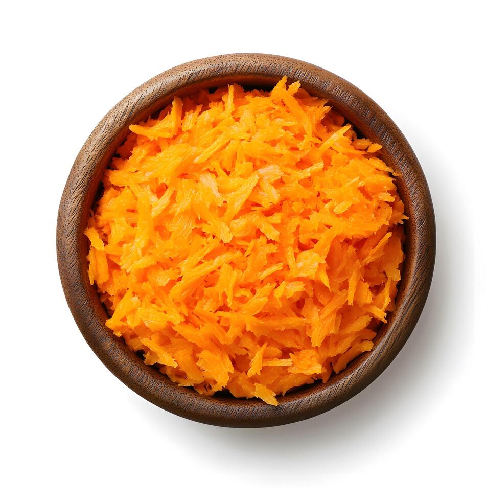 Carrot shavings in a wooden bowl on a white background photo