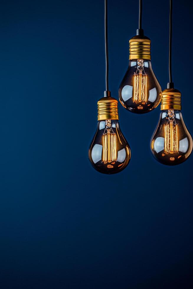three hanging light bulbs photo