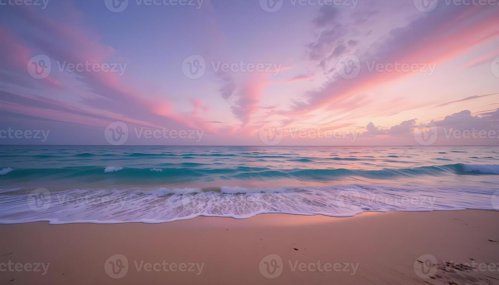 A beautiful sunset over the ocean and beach photo
