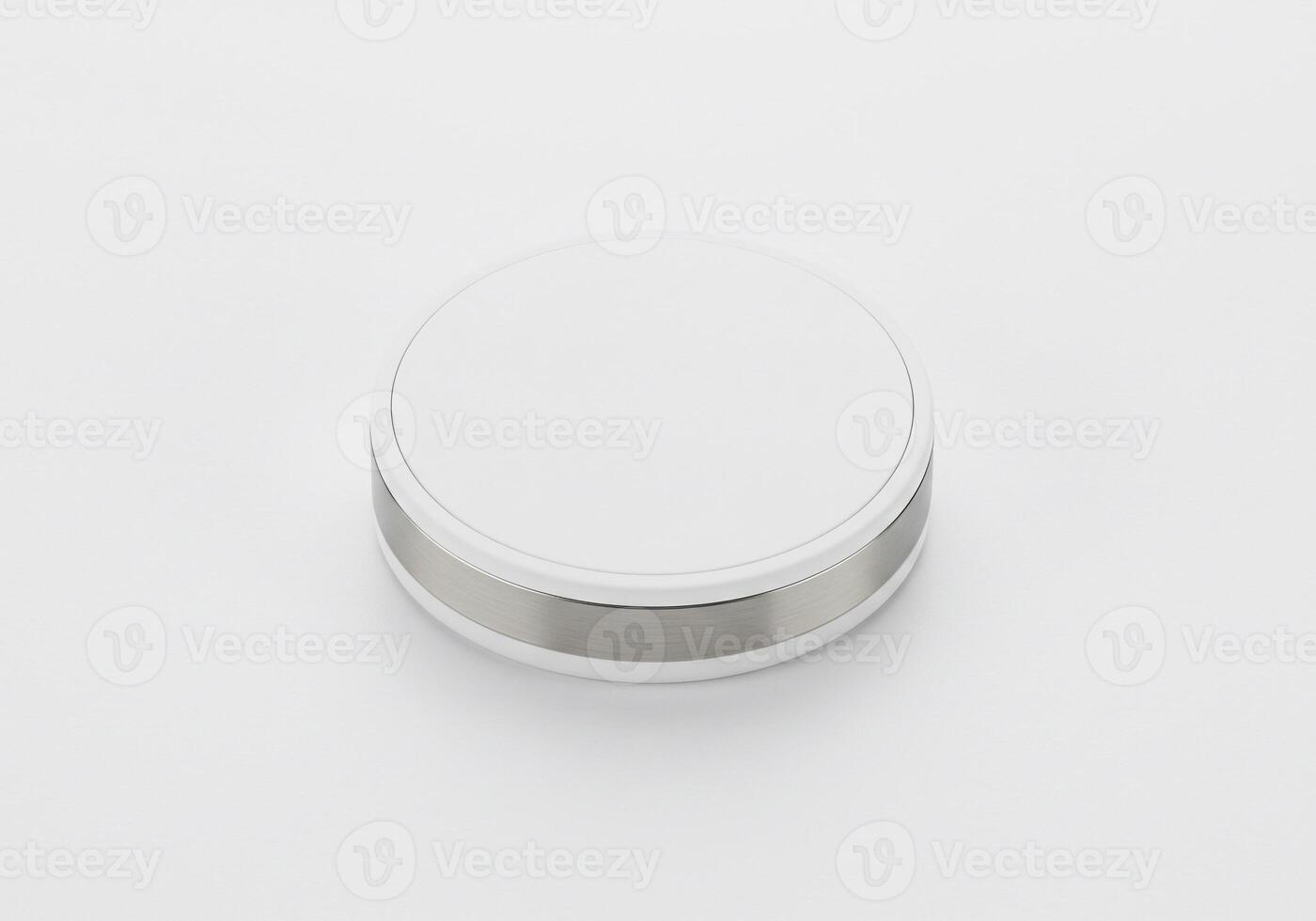 A white button on a white surface photo