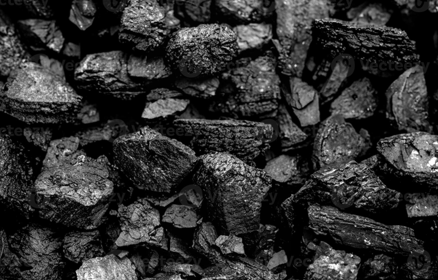 Close-Up of Rough Black Coal Rocks Texture photo