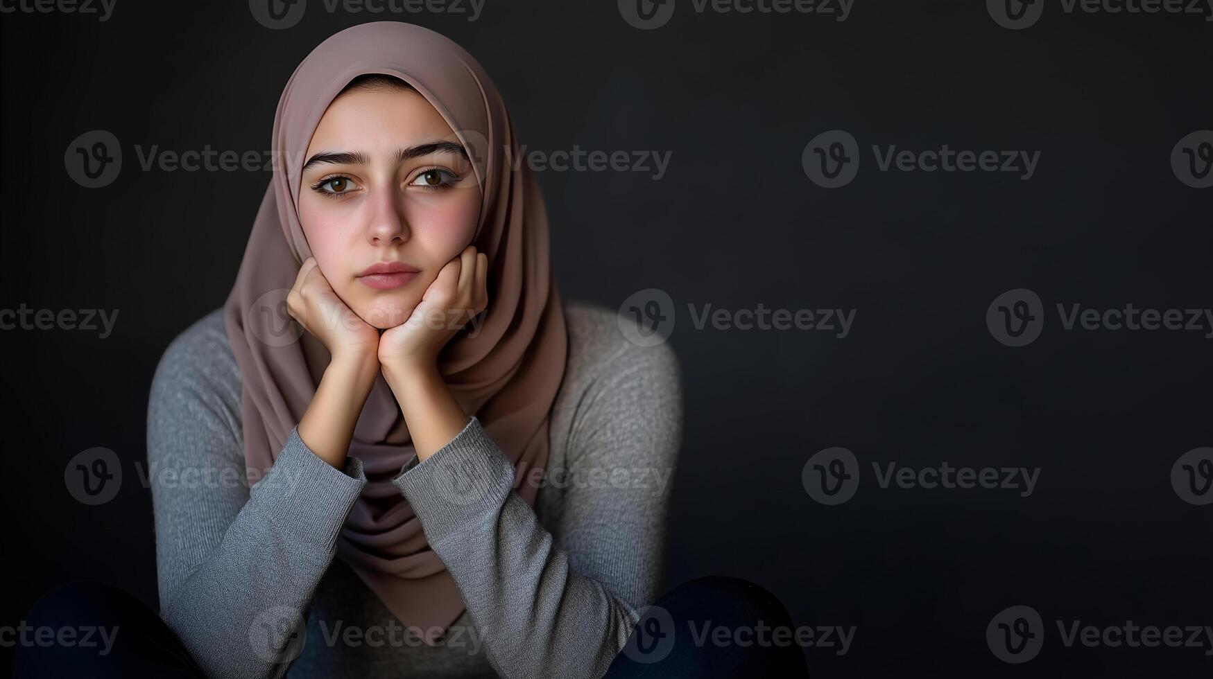 Young Hijab Lady in Nervous Fidgeting Pose. Facial Expression Portrait Concept. photo