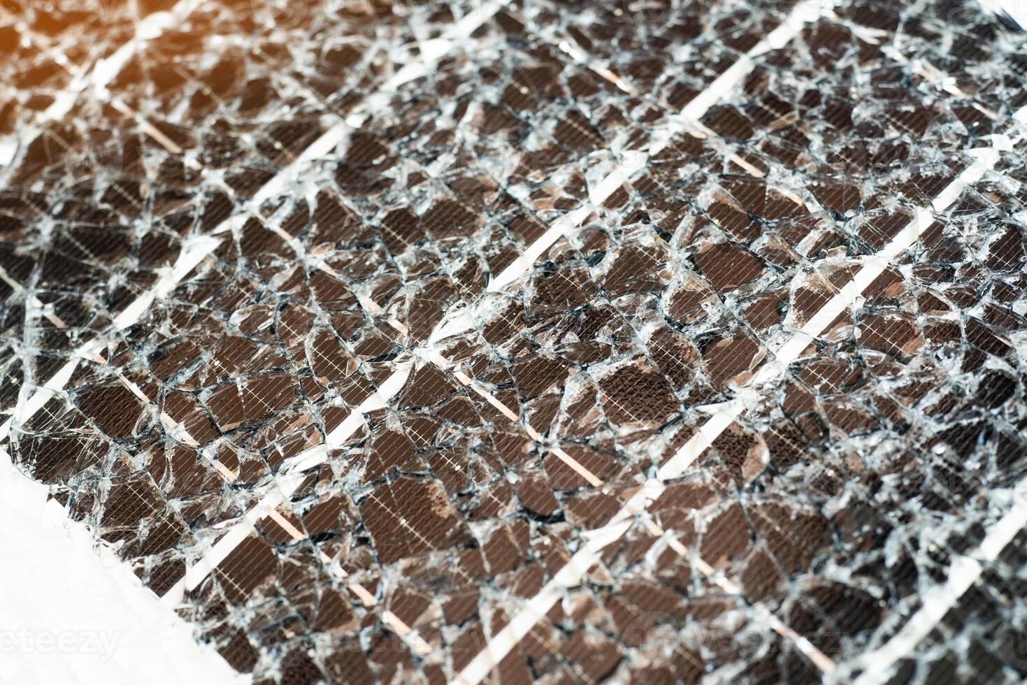 Close up of Damaged solar panel , broken glass solar panel. photo
