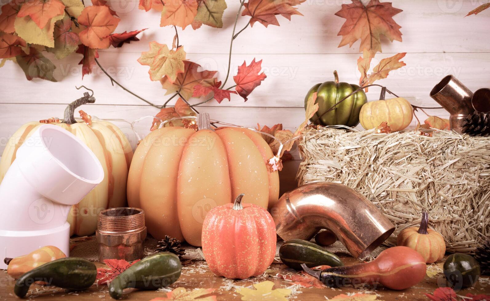 Happy Thanksgiving with construction tools, maple leaves and pumpkin . photo