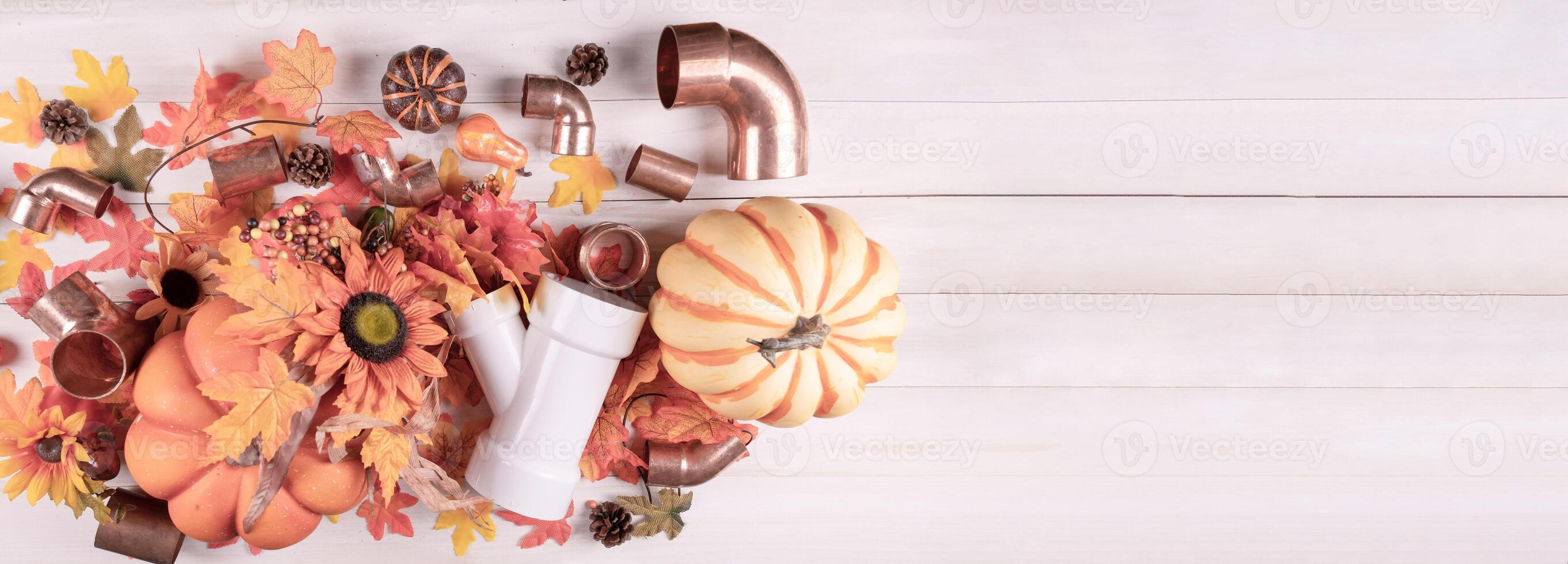 Autumn composition with plumbing tools. photo