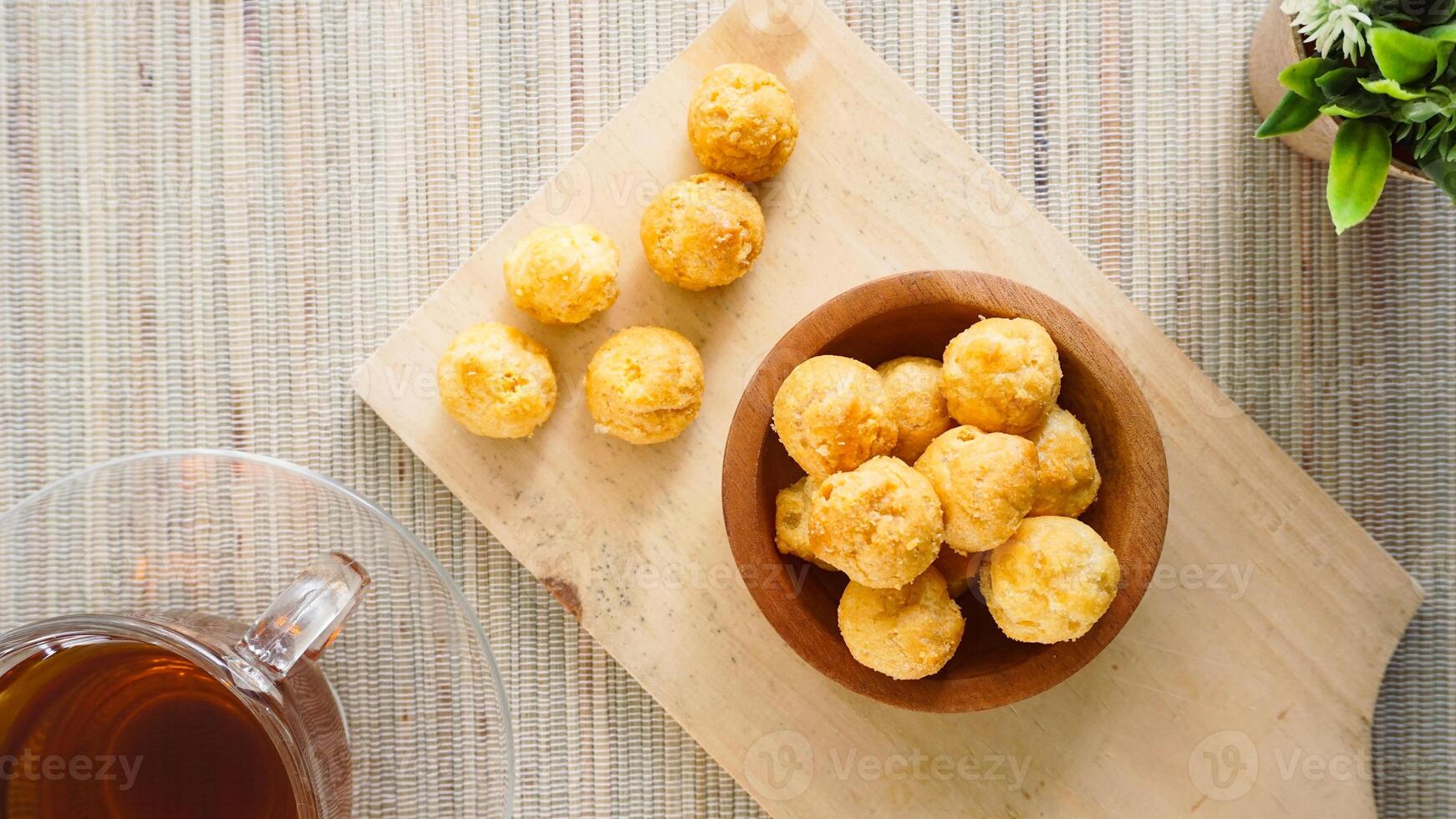 Cheese balls served with tea photo