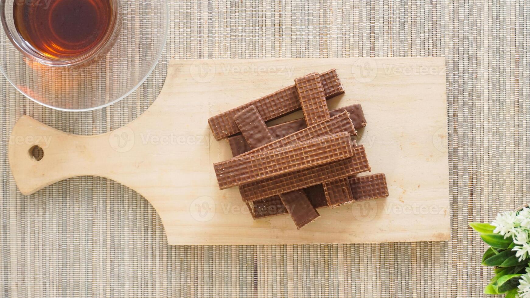 Chocolate wafers on a wooden board photo