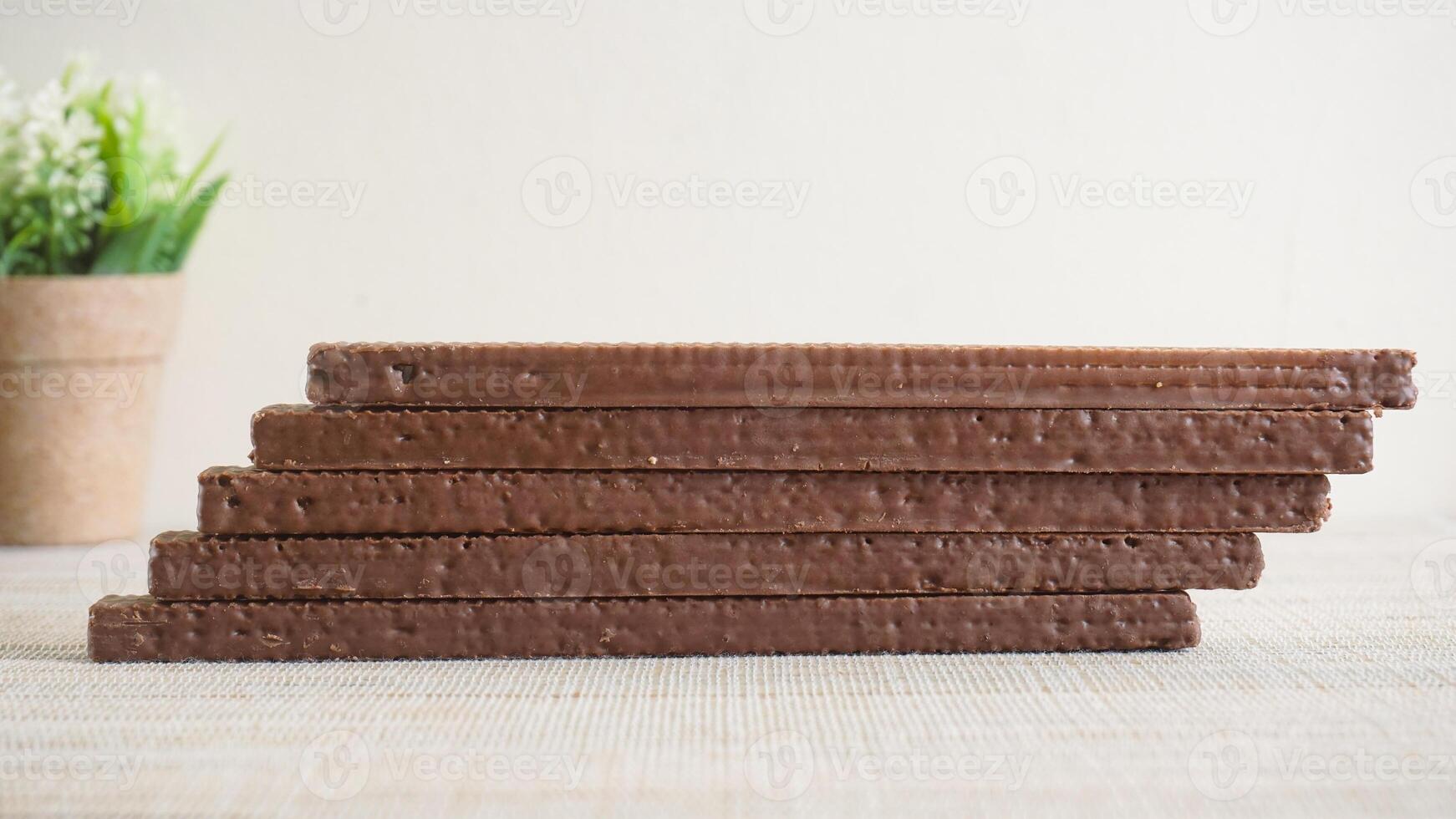 Stack of chocolate wafers arranged neatly photo