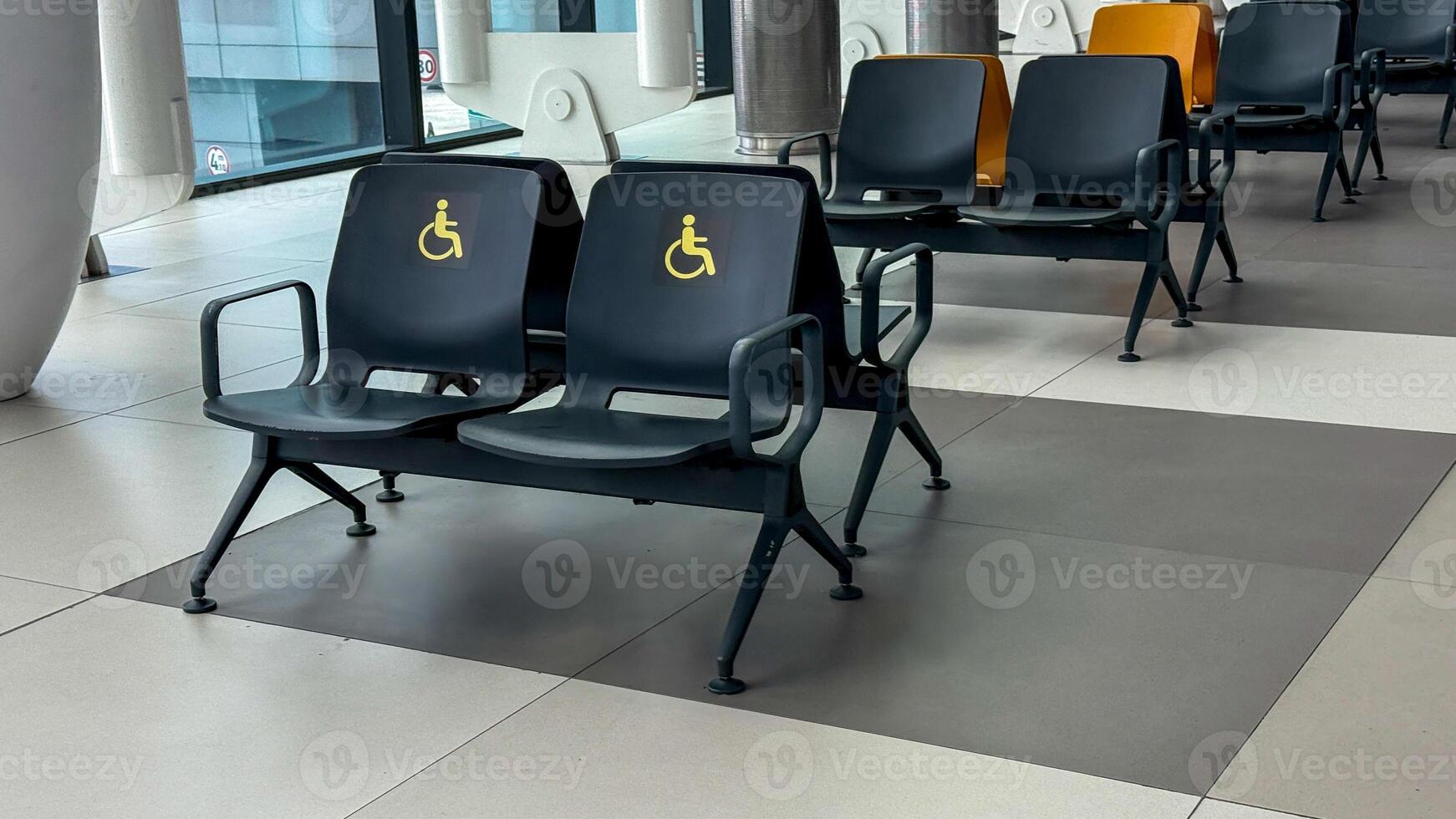 Reserved for universal accessibility, airport chairs whisper tranquility, echoing Equality Day and International Day of Persons with Disabilities photo