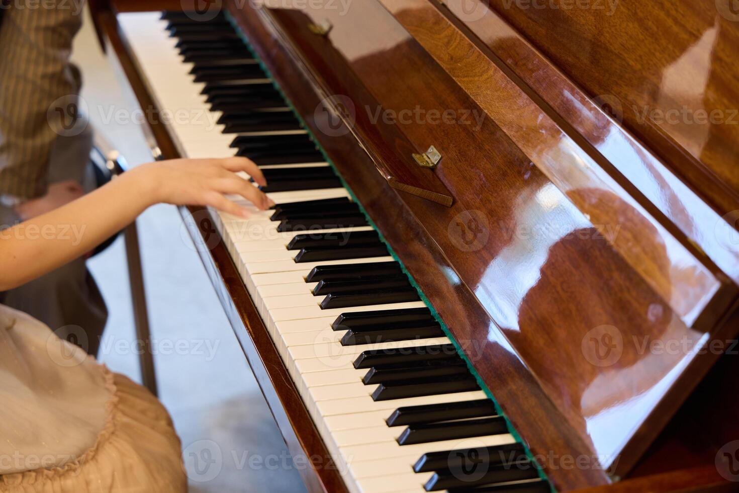 An Elegant and Captivating Piano Performance Showcasing Graceful Hand Movements and Skills photo