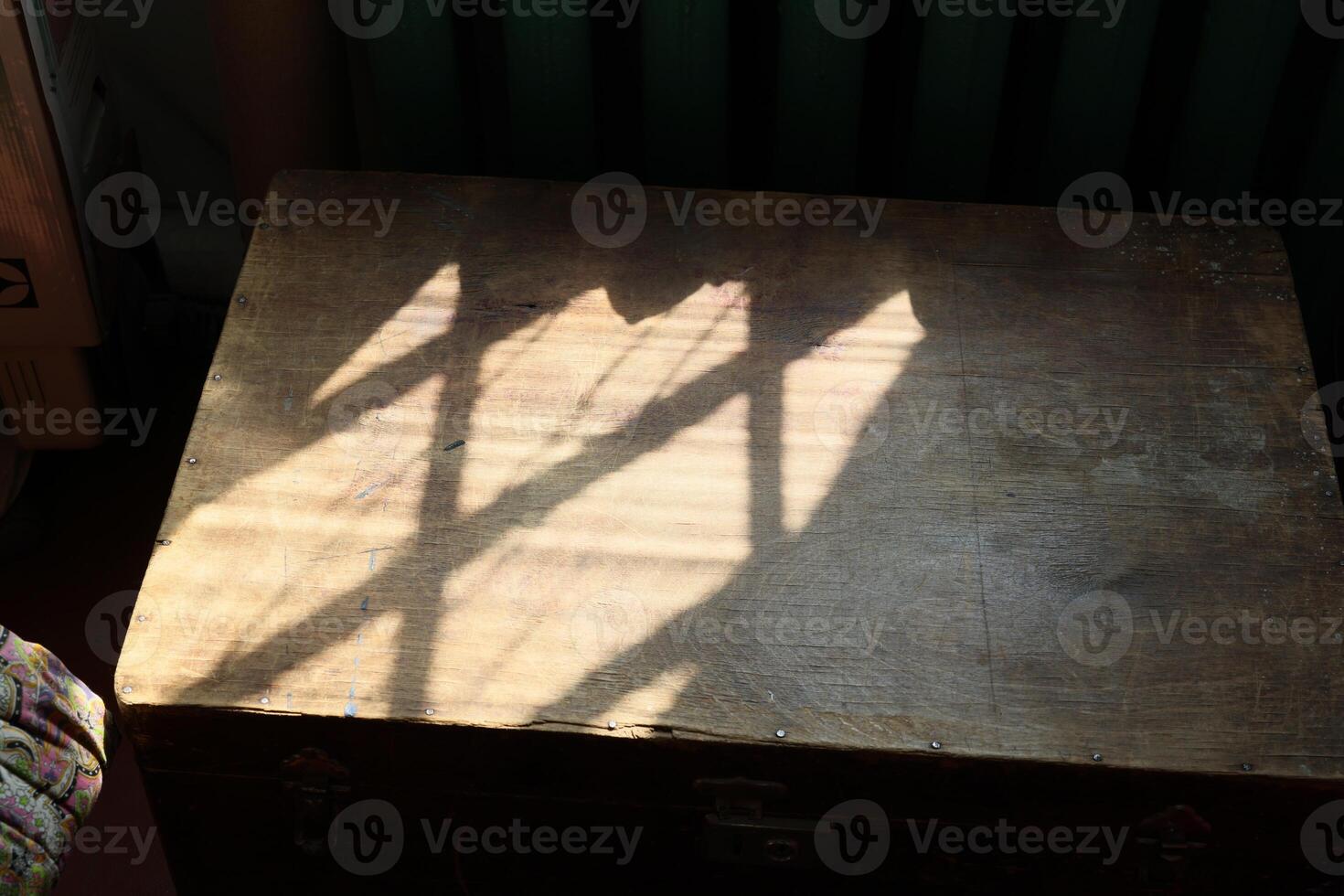 Sunlight creates beautiful patterns on wood, enhancing its visual appeal and charm photo