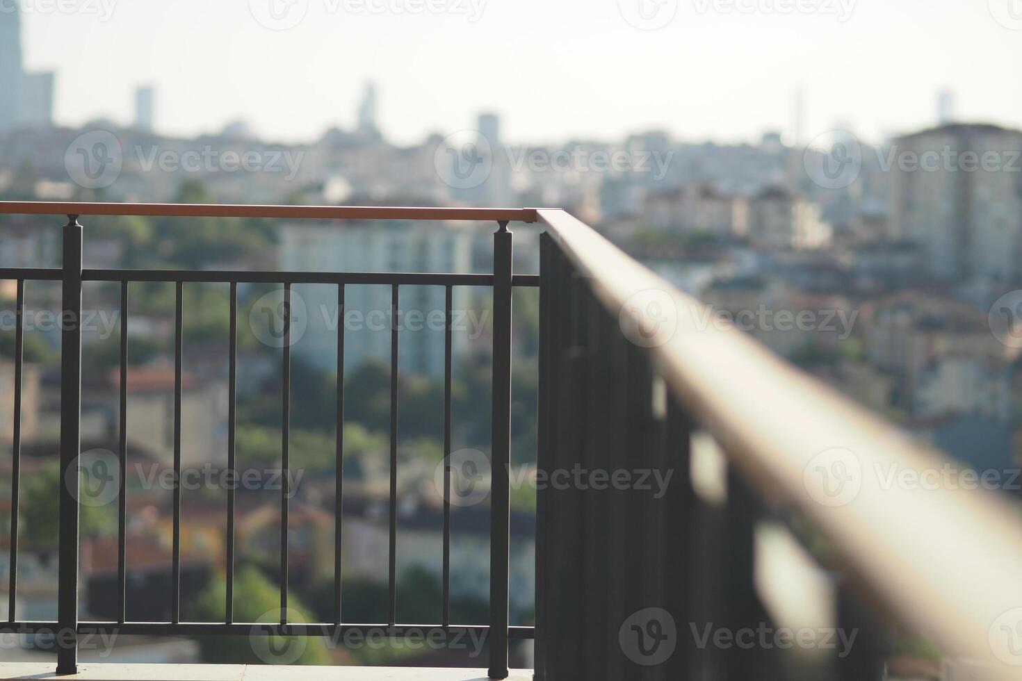 View over urban landscape from balcony railing photo