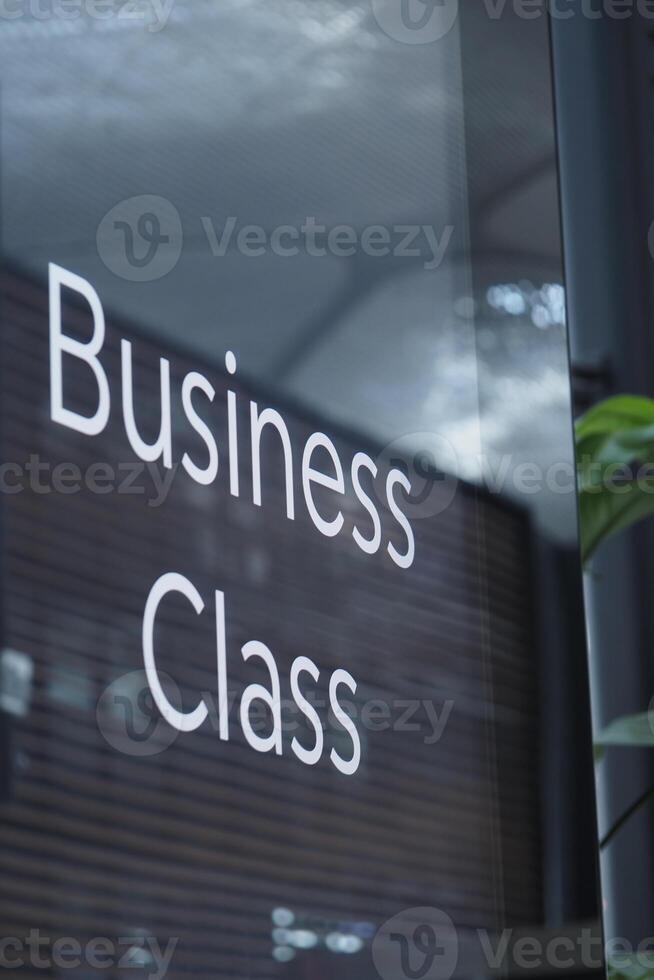 Business class sign at a modern airport terminal photo