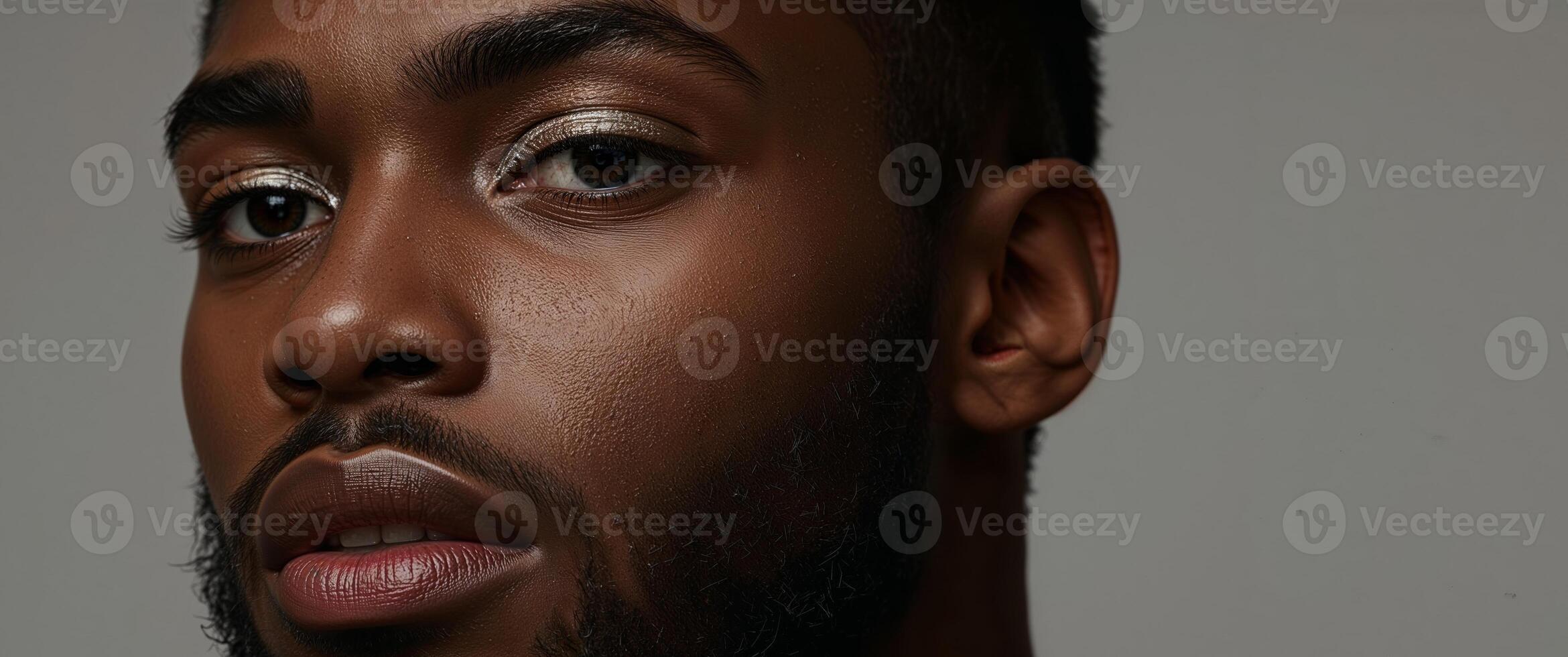 A close up of a black man with a beard photo