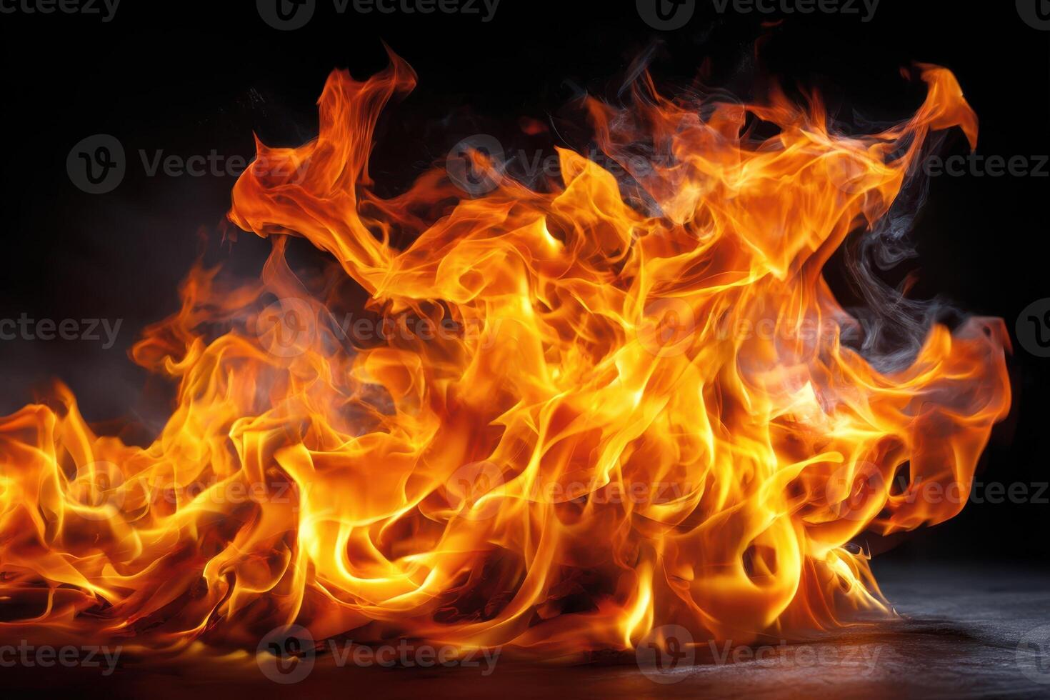 Flames dance vividly in a dark background showcasing fire's raw beauty and intensity photo