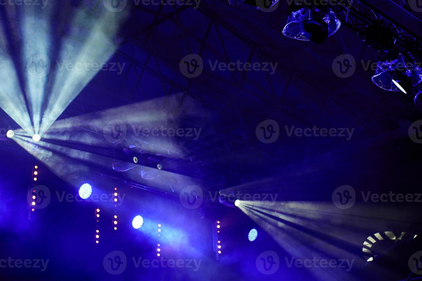 Stage lights and spotlights during concert show photo