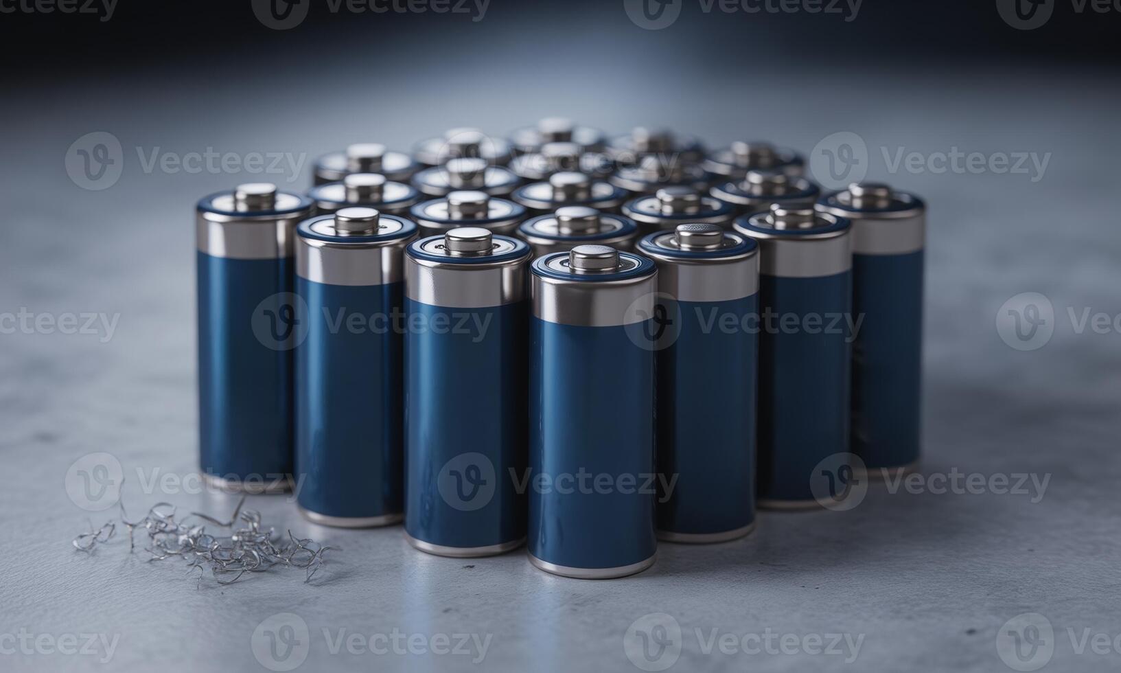 Pile of blue lithium ion batteries for sustainable energy and modern power supply photo