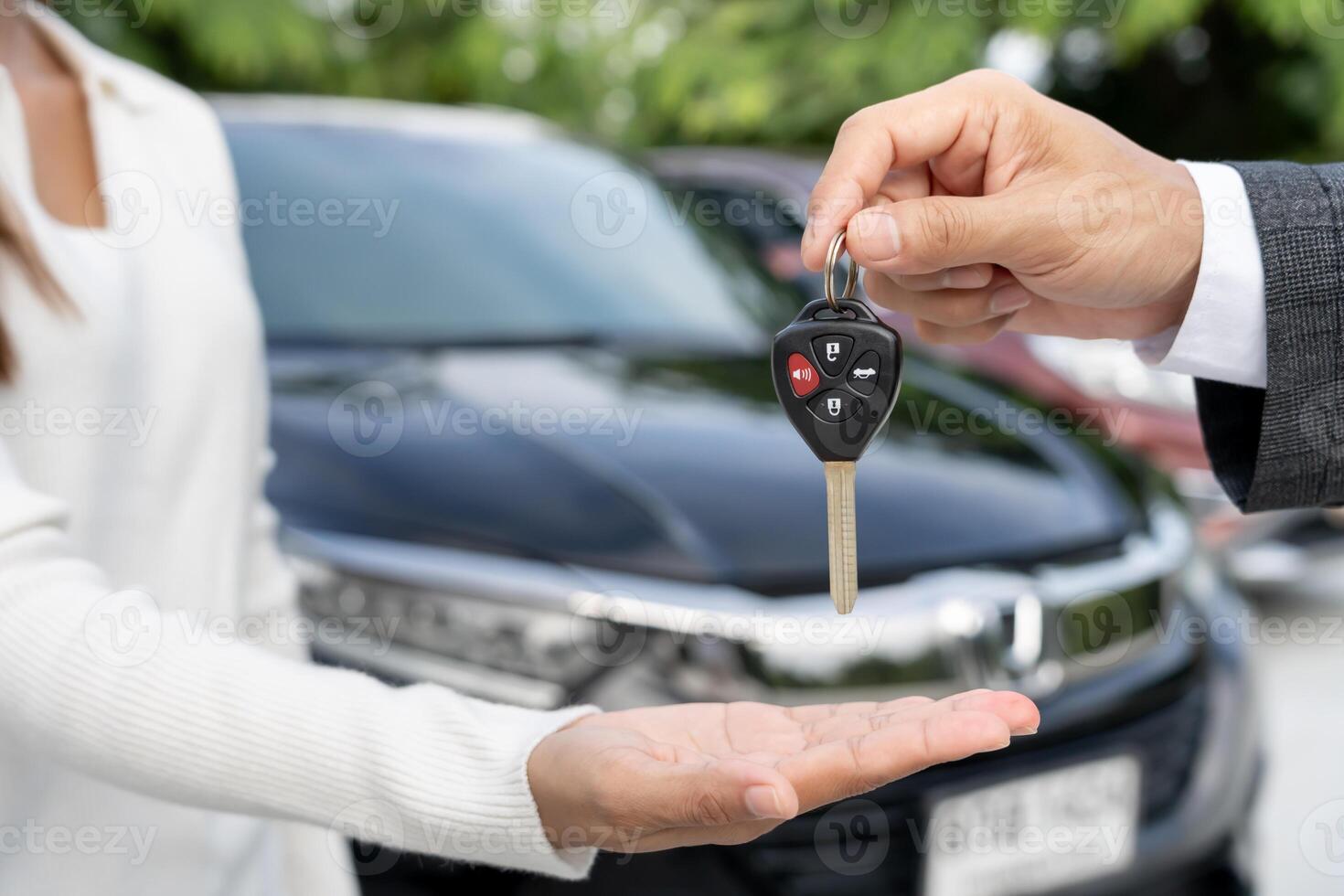 lease, rental car, sell, buy. Dealership manager send car keys to the new owner. Sales, loan credit financial, rent vehicle, insurance, renting, Seller, dealer installment car care business. photo