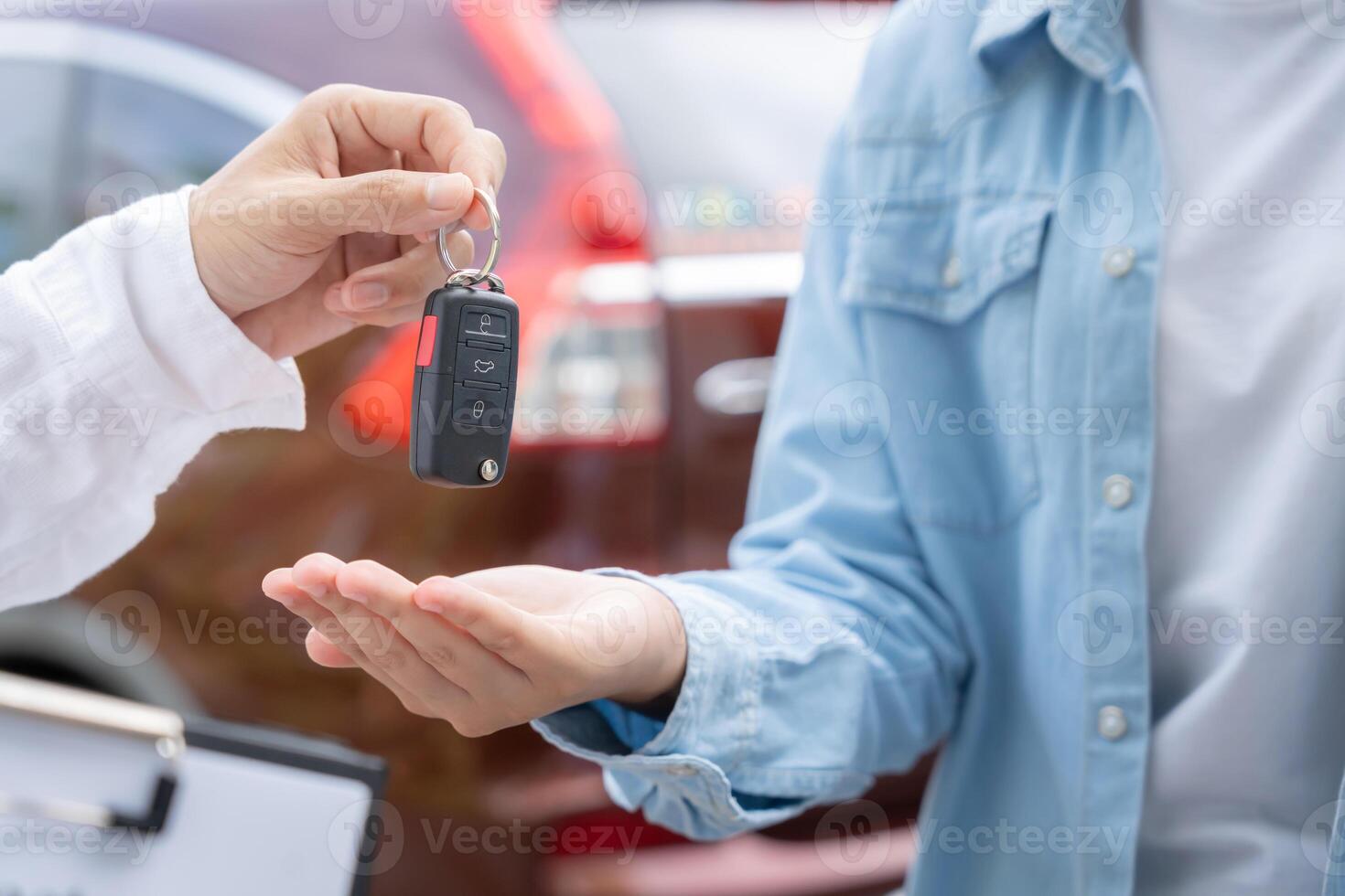 lease, rental car sell, buy. Dealership manager send car keys to the new owner. Sales, loan credit financial, rent vehicle, insurance, renting, Seller, dealer, installment, car care business photo