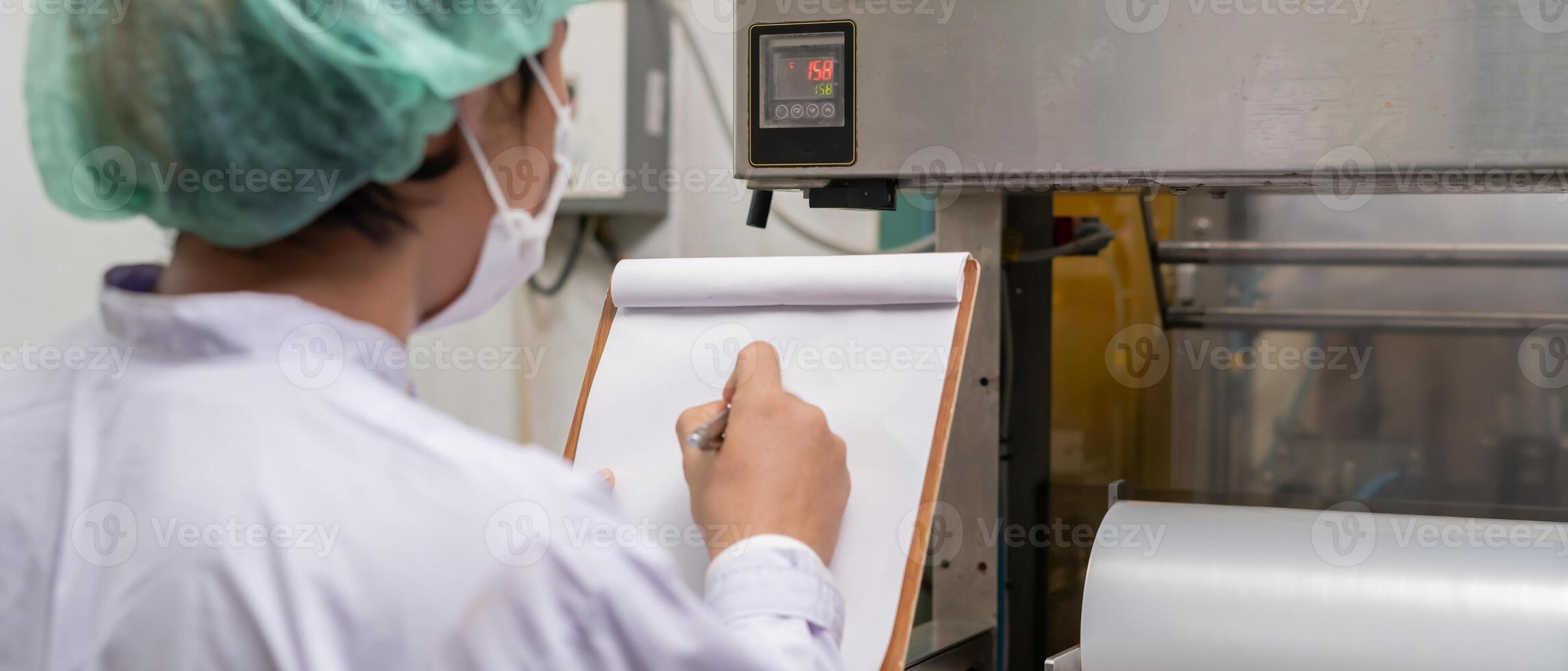 beverages technician inspection about condition control food or beverages before send product to the customer. Production leader recheck machine and productivity photo