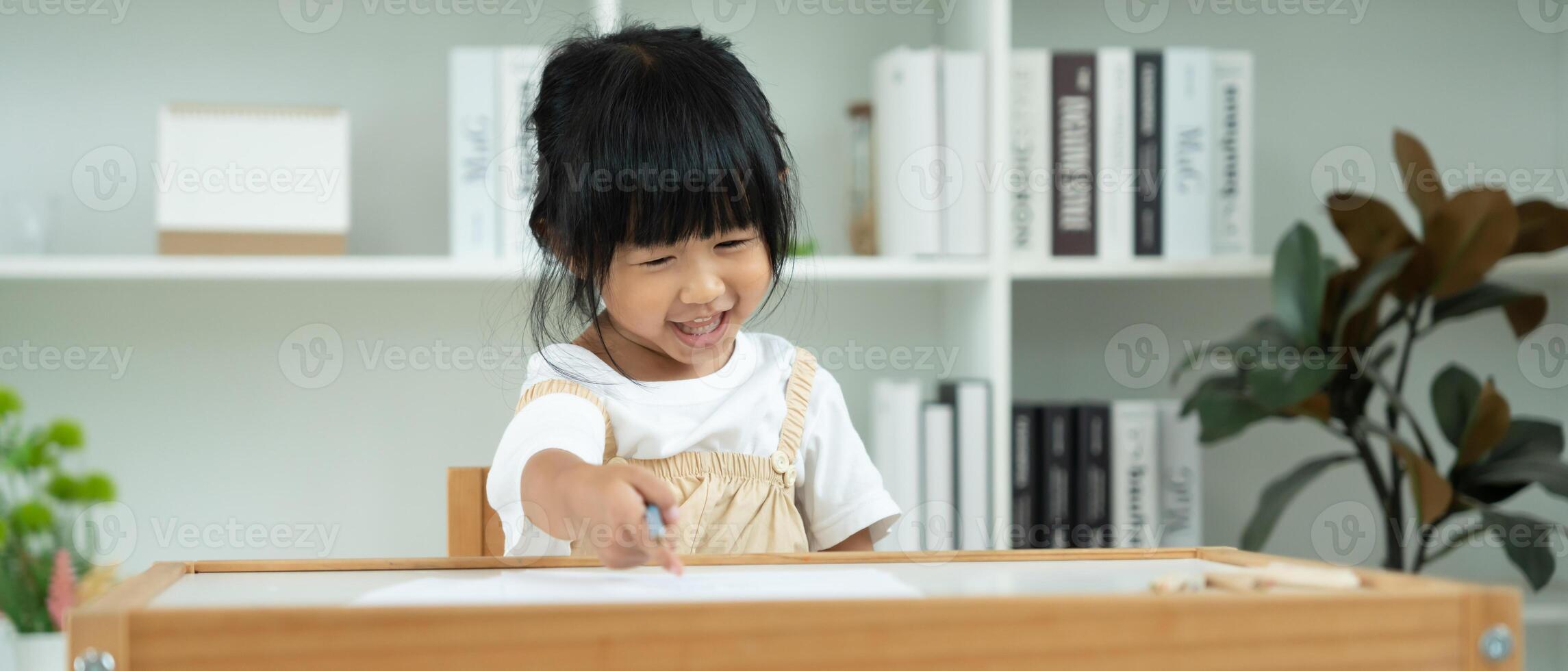 Happy Asia children learning and enjoy paint. family is happy and excited in the house. Mother and daughter having fun spending time together. Holiday, Activity, Executive Function. EQ photo