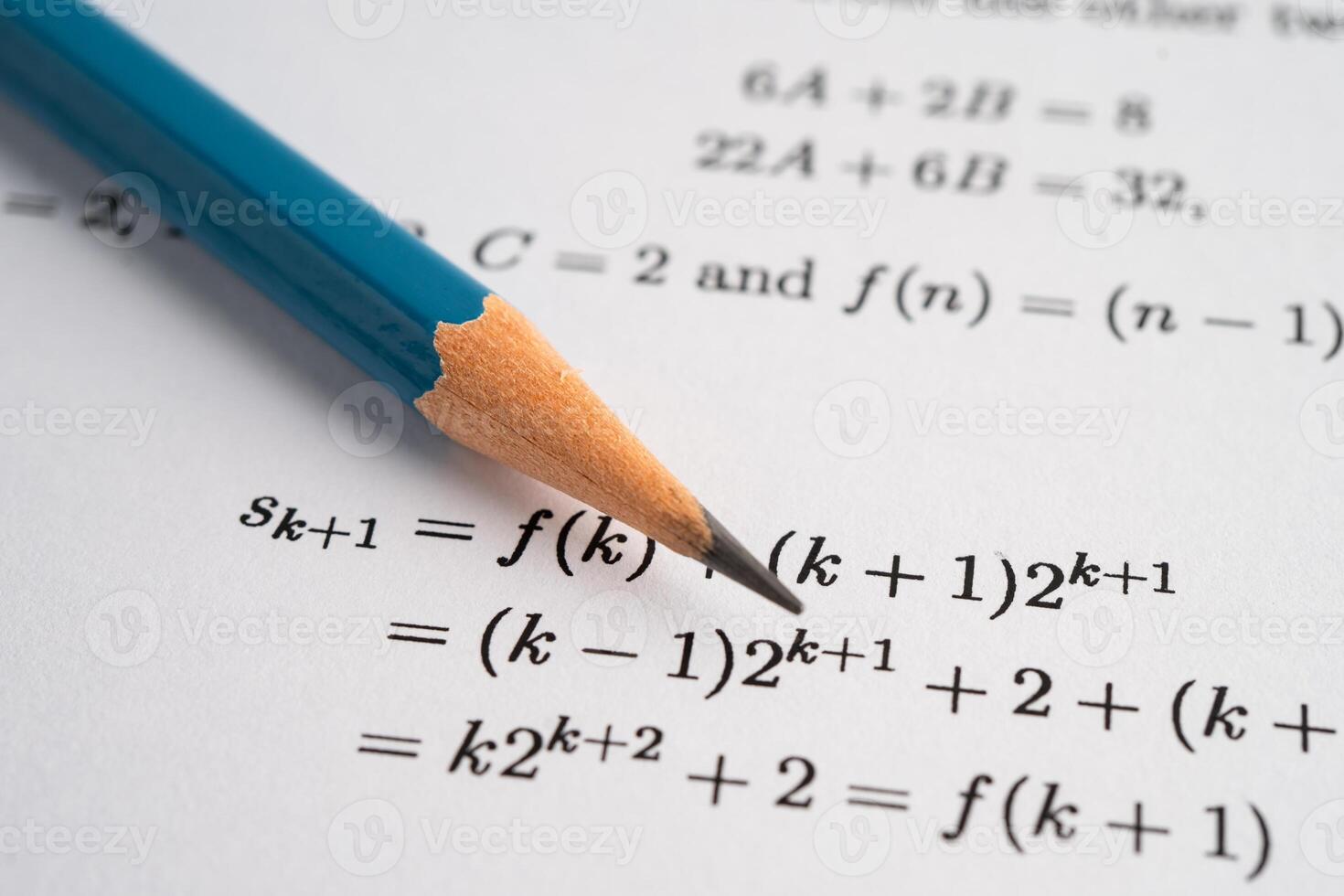 Pencil on mathematic formula exercise test paper in school. photo