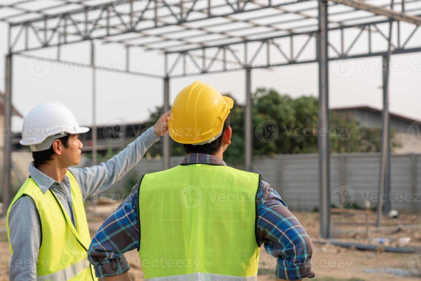 inspector engineer and owner project inspecting construction and quality assurance new house. Engineers or architects or contactor work to build the house. photo