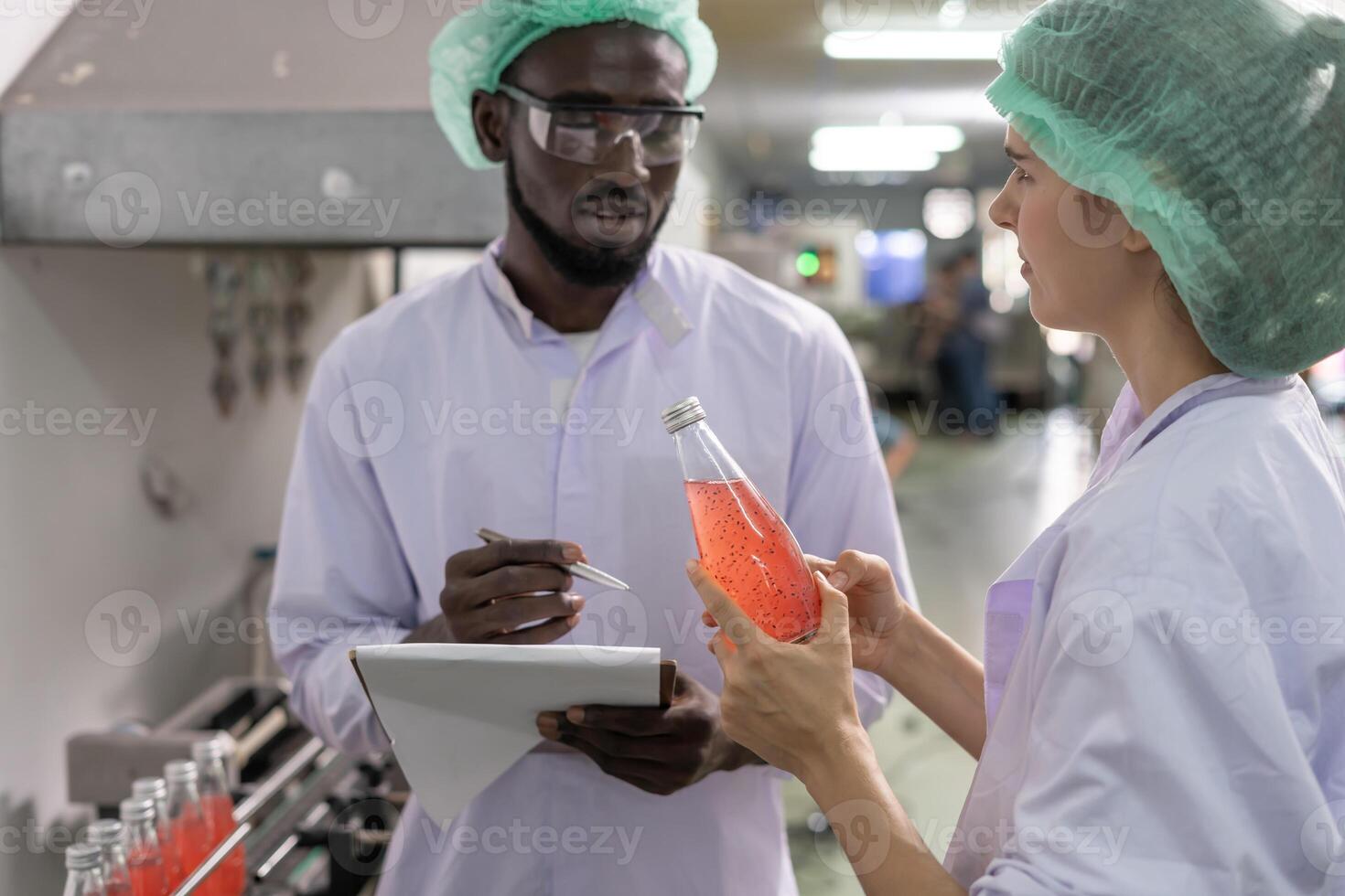 beverages technician inspection about quality control food or beverages before send product to the customer. Production leader recheck ingredient and productivity photo