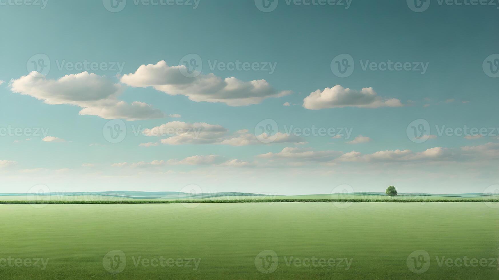 Serene green field under a pastel sky with fluffy clouds and distant tree photo