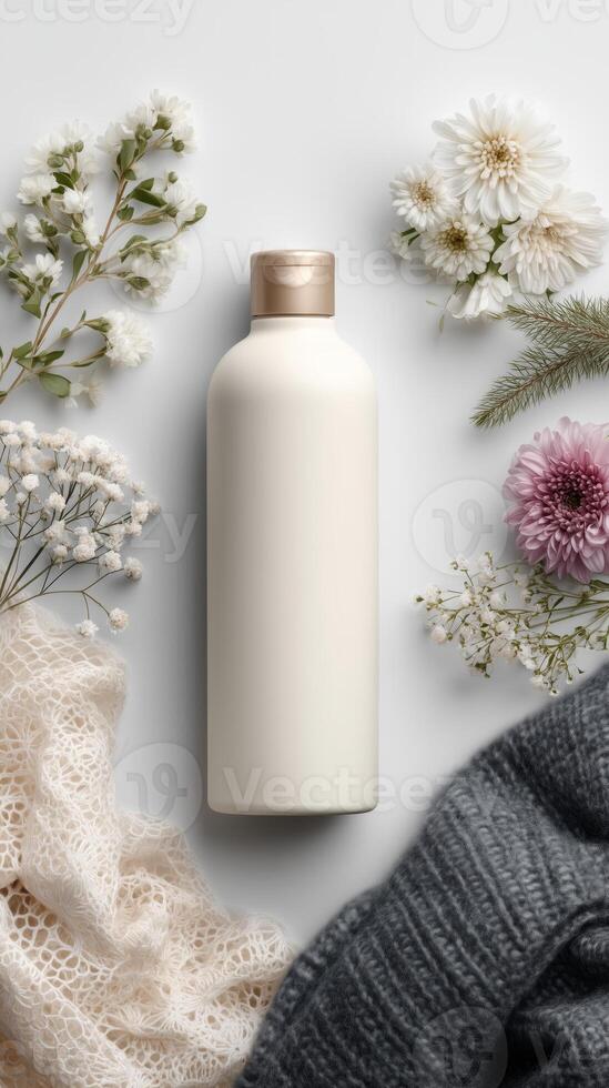 A bottle of fabric conditioner surrounded by floating fabric textures. photo