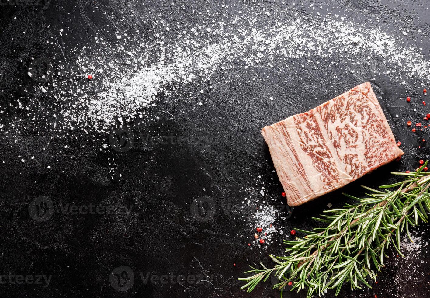 Marbled meat with rosemary and salt photo