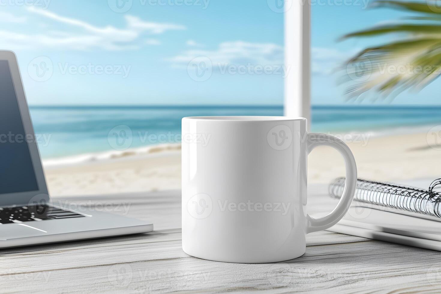 White Coffee Mug on Beachside Desk with Laptop and Ocean View photo