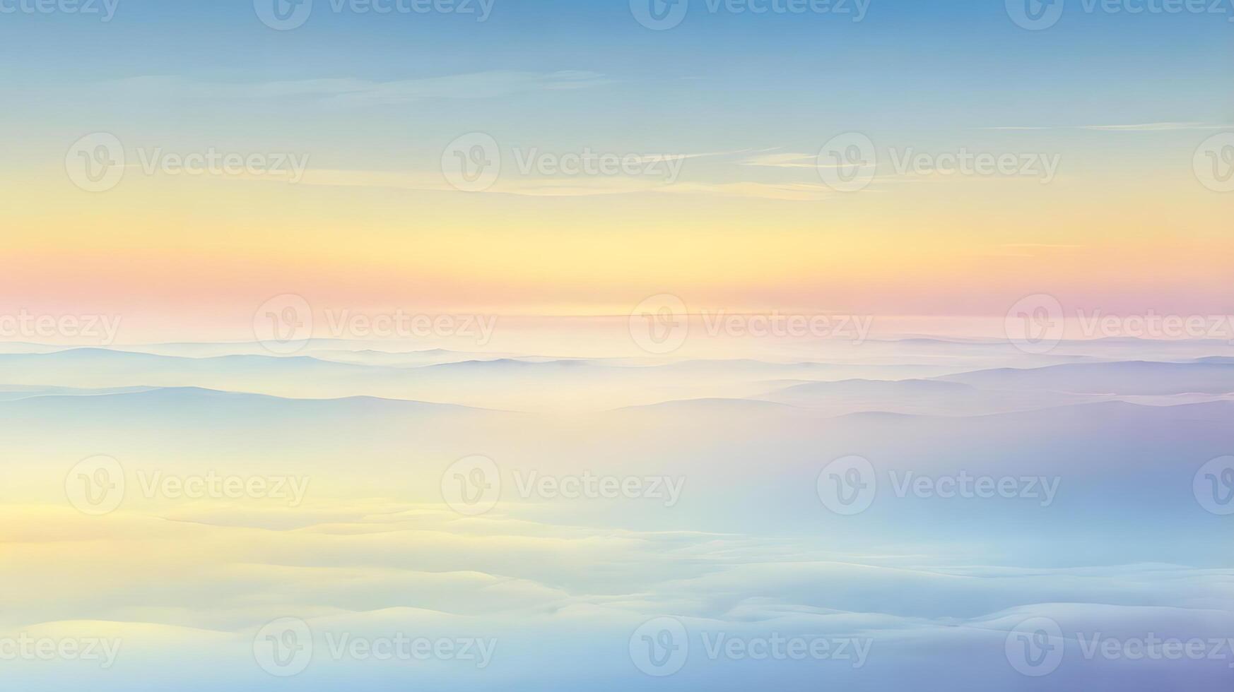 Serene Aerial View of Misty Mountains Under a Pastel Sky at Dawn photo